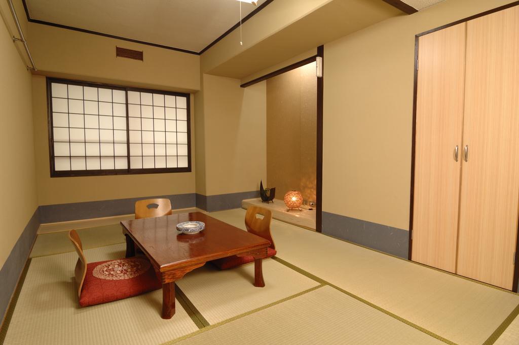 Hotel Iida Kyoto Rum bild