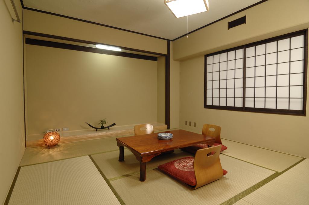 Hotel Iida Kyoto Rum bild