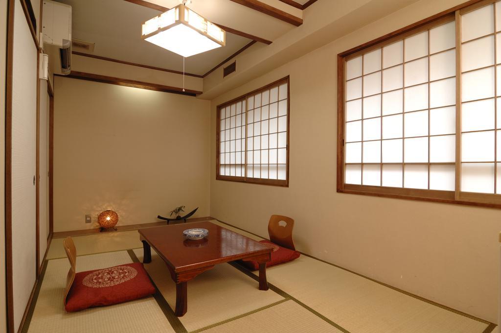 Hotel Iida Kyoto Rum bild