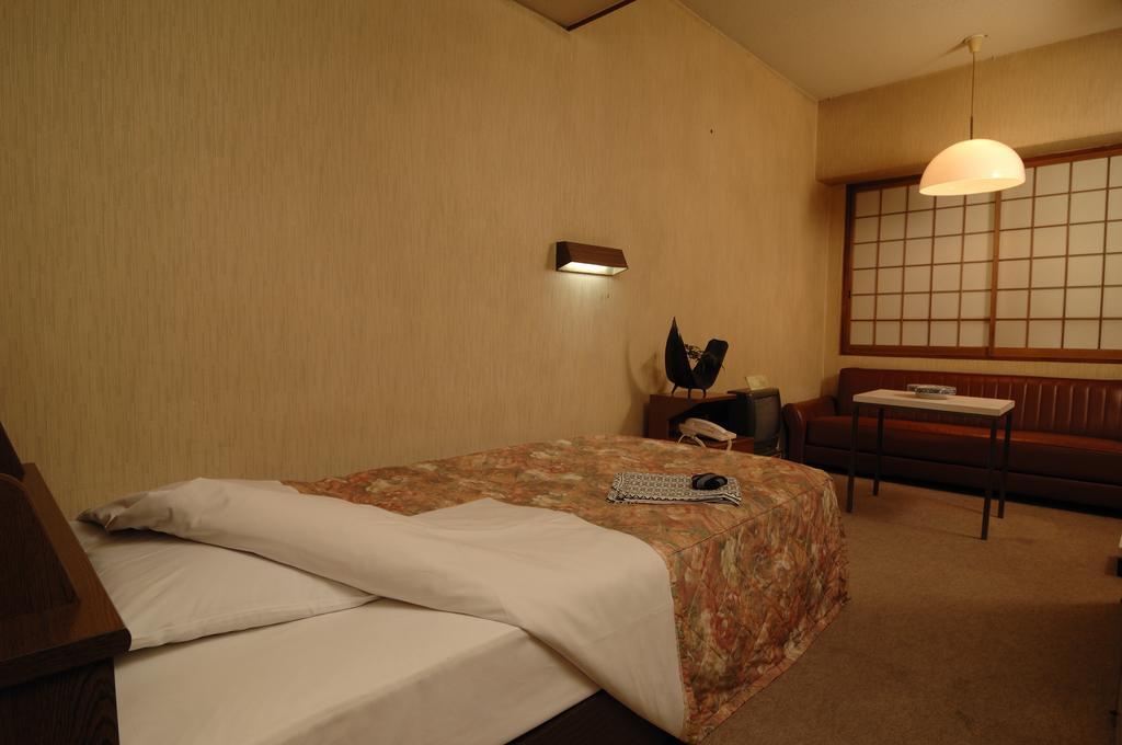 Hotel Iida Kyoto Rum bild